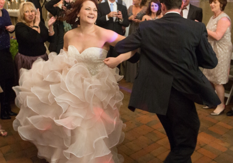 Wedding couple dancing at their reception